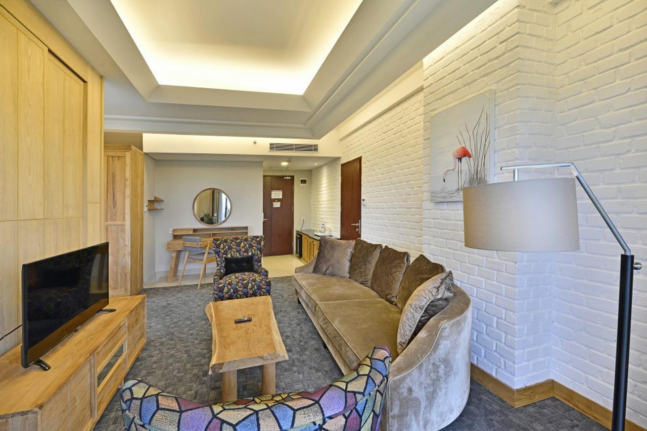 Famvida Hotel Lubuklinggau Chambre photo