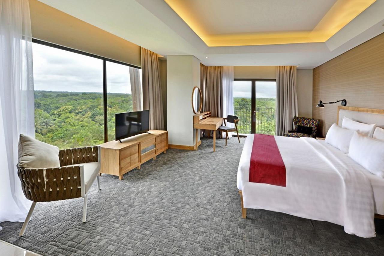 Famvida Hotel Lubuklinggau Chambre photo