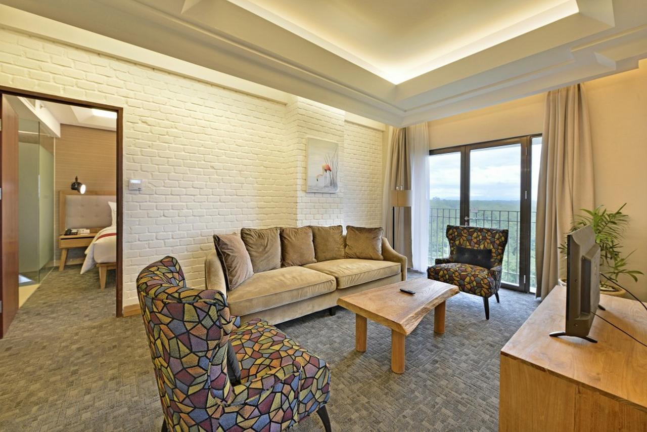 Famvida Hotel Lubuklinggau Chambre photo