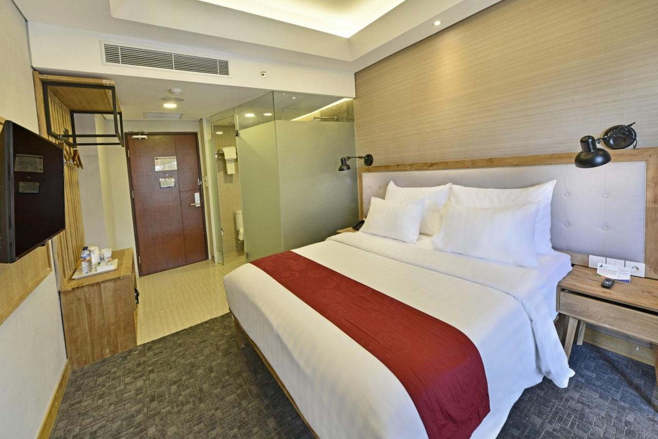 Famvida Hotel Lubuklinggau Extérieur photo