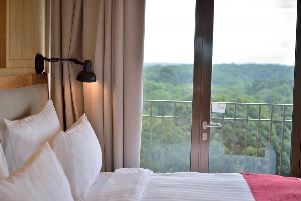 Famvida Hotel Lubuklinggau Chambre photo