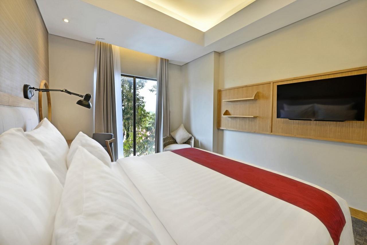 Famvida Hotel Lubuklinggau Extérieur photo